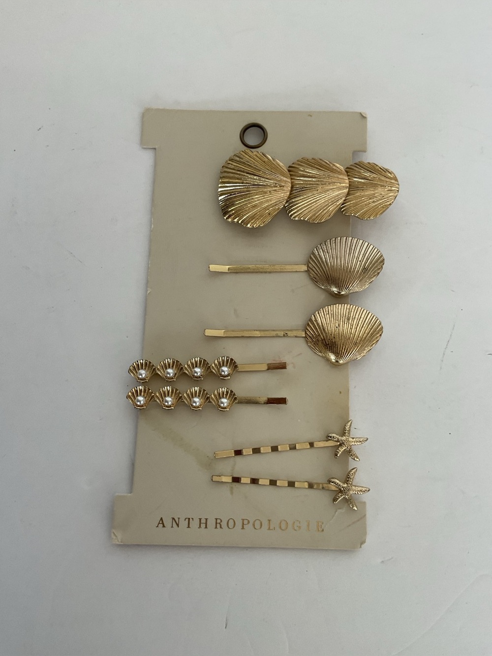 Anthropologie Gold she’ll hair clips NWT